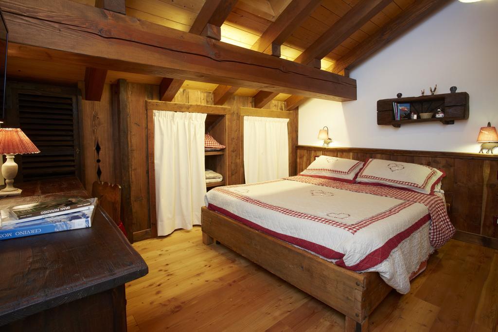 Ferienwohnung Le Bibelot Nus Zimmer foto